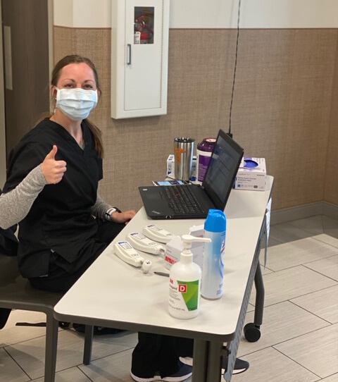 testing Staff wearing masks